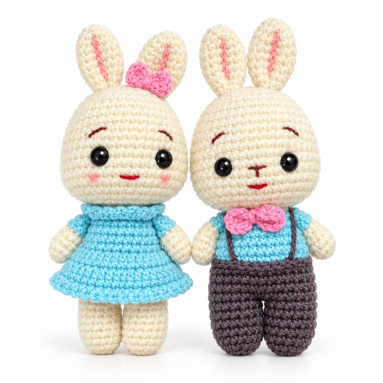 Crocheted Bunny Couple in Pastel Outfits.png
